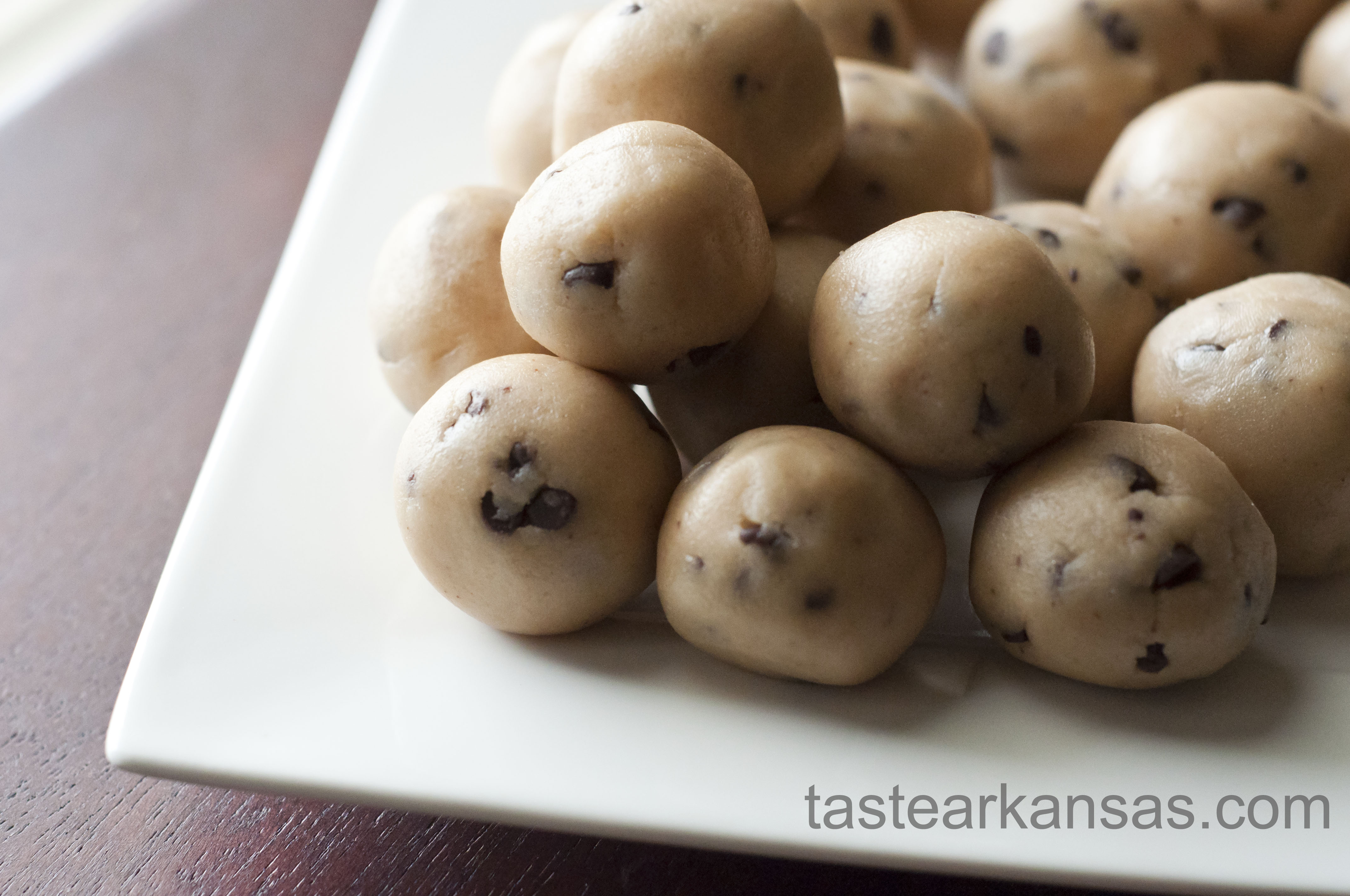 this image is of a plate of cookie dough bites that have no eggs and don't require any baking