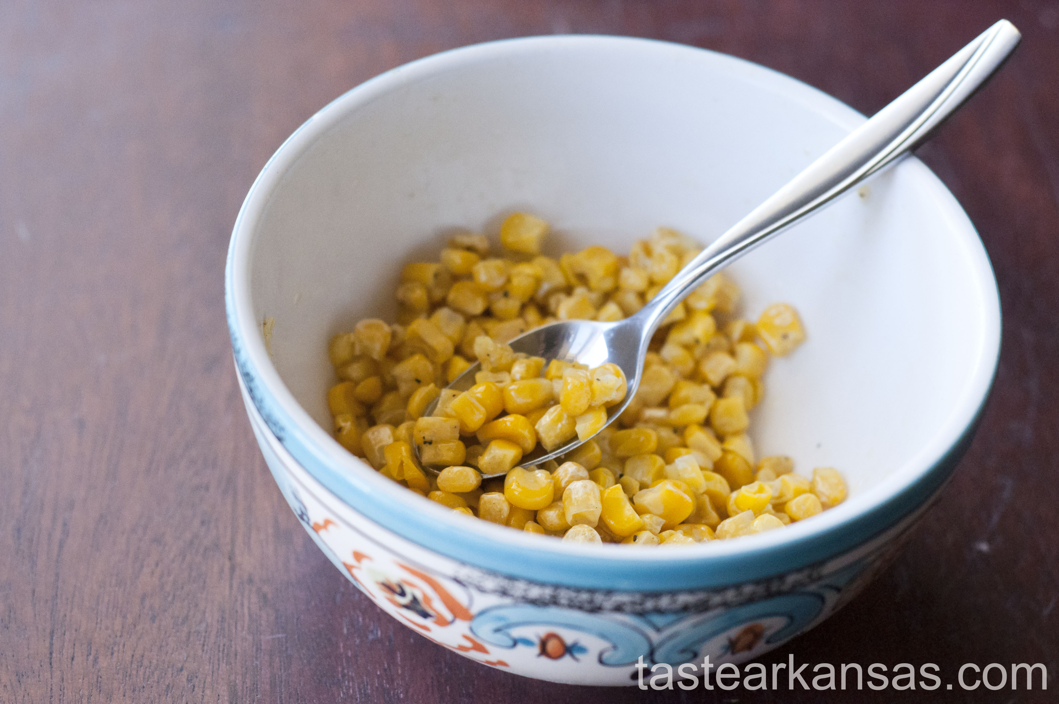 this is an image of a bowl of roasted corn